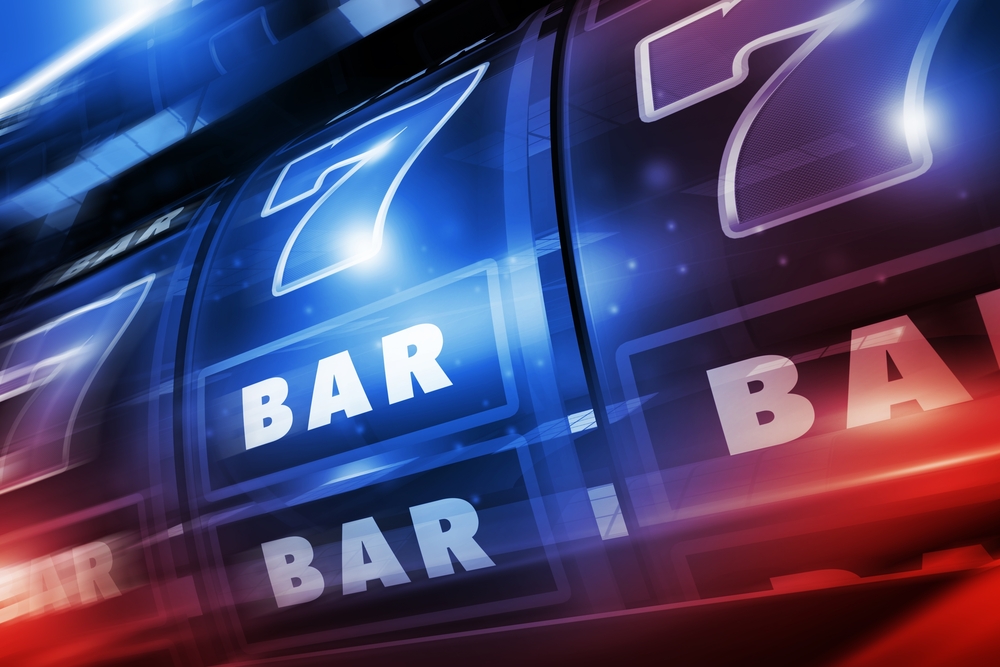 Glowing,Blue,And,Red,Illuminated,Casino,Slot,Machine,3d,Concept Tipos de Casino Bonus para os Jogadores brasileiros